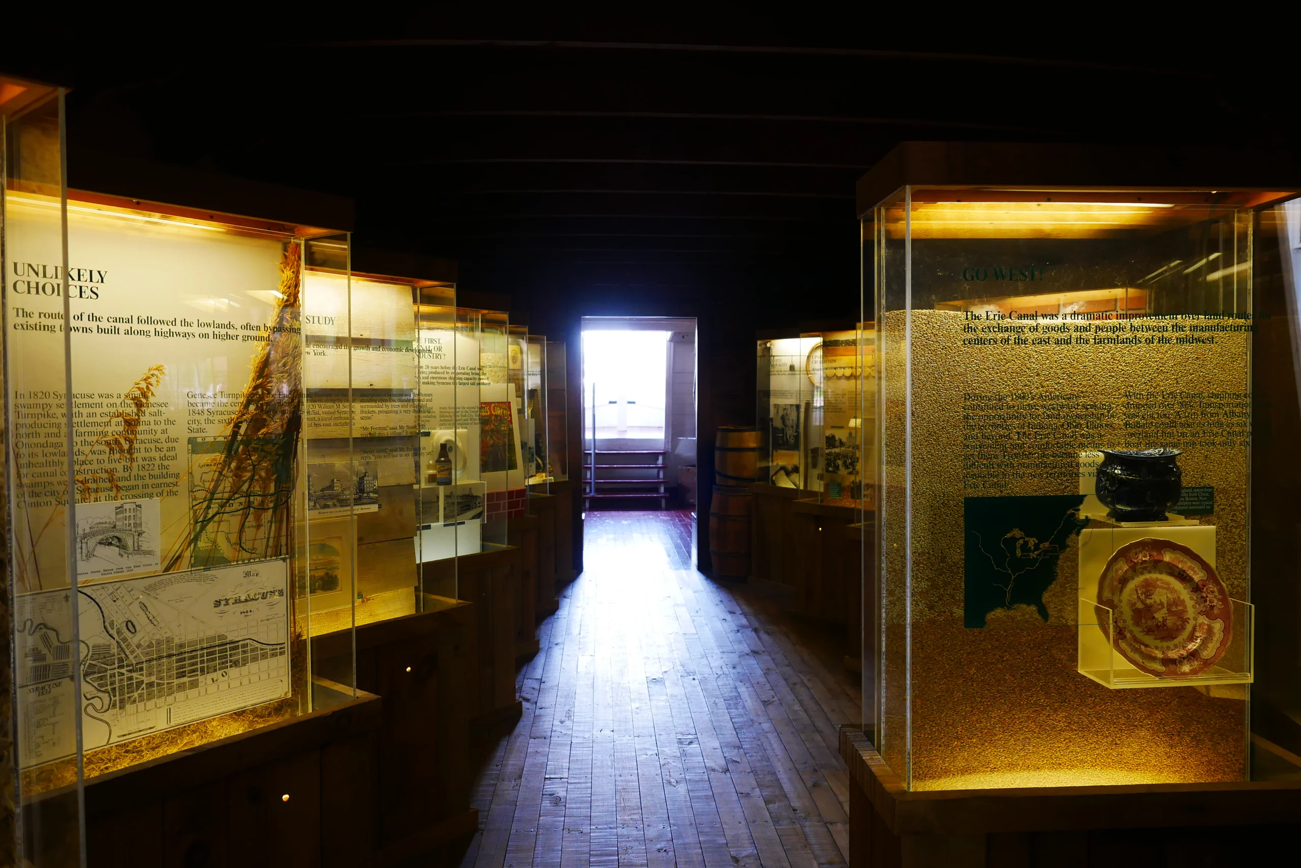 Canal boat replica and barge display inside the Erie Canal Museum in Syracuse