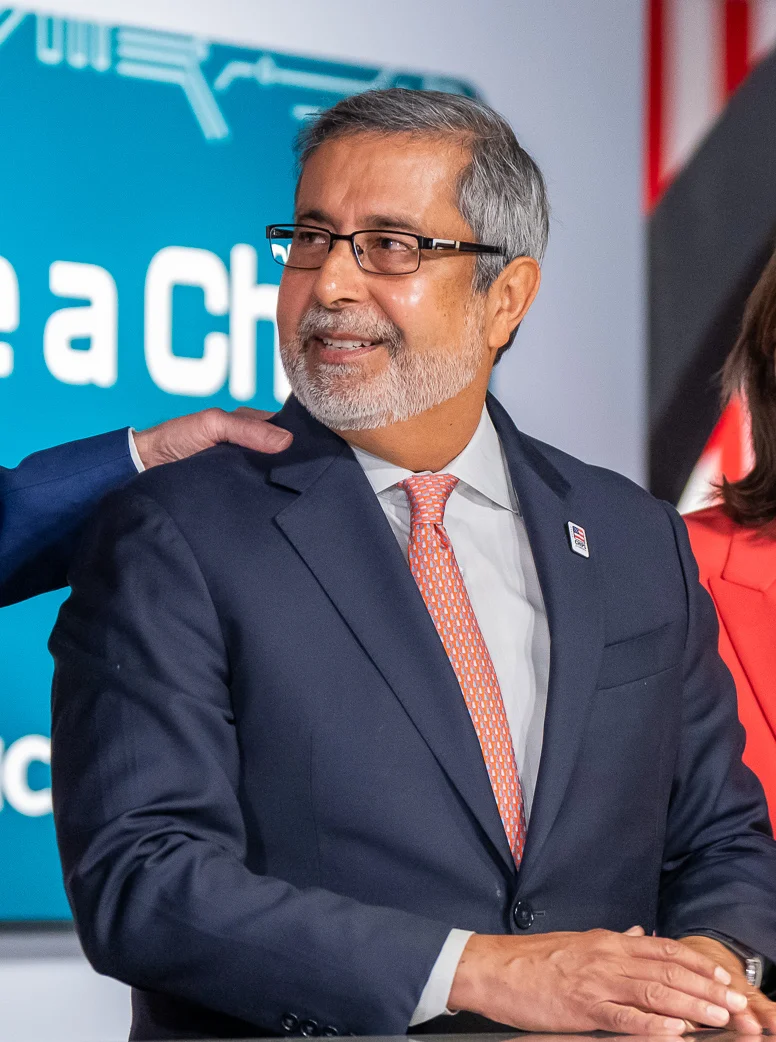 Micron CEO Sanjay Mehrotra in Syracuse with President Biden and Governor Hochul, April 2024