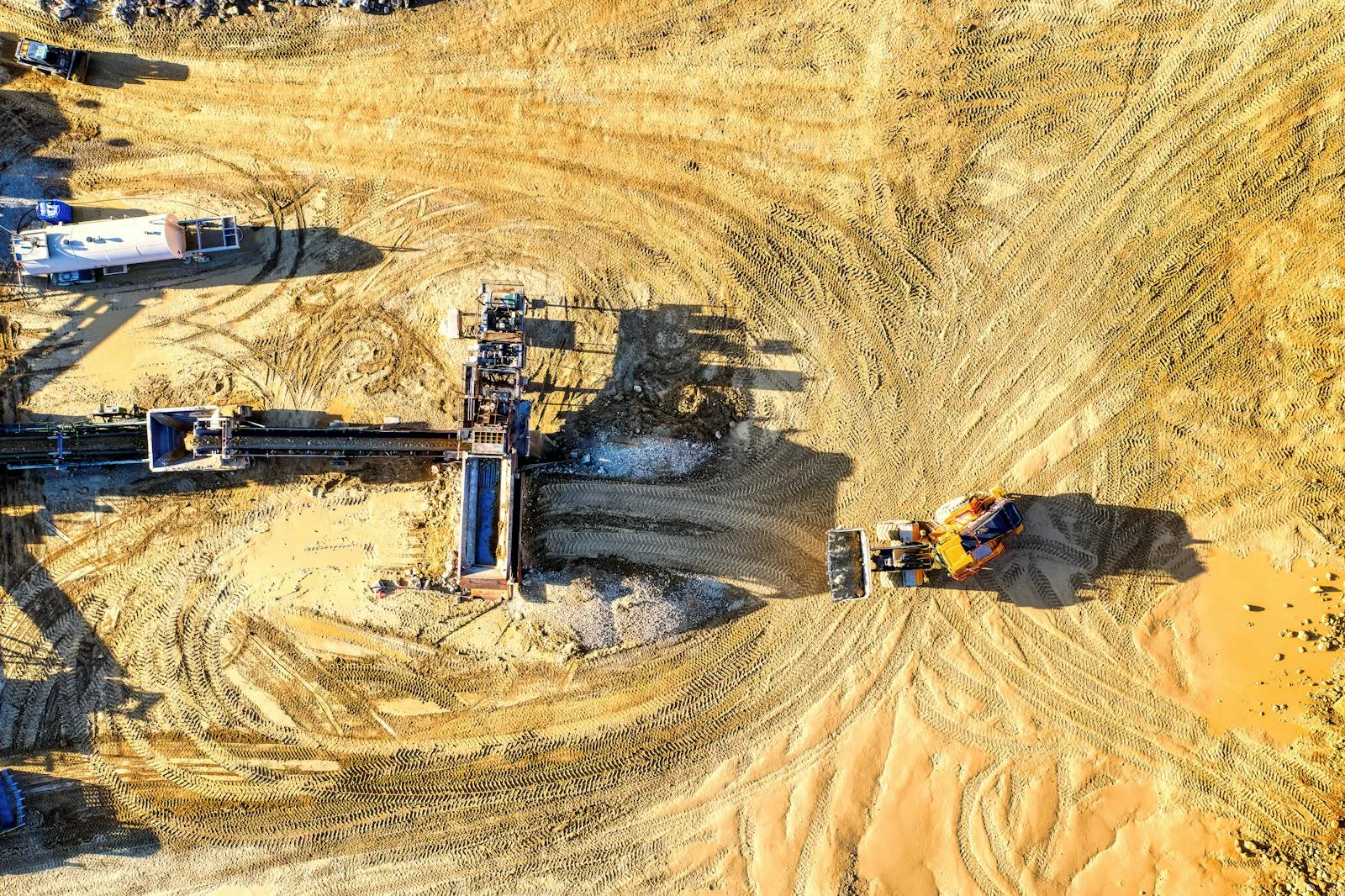 Aerial view of a large-scale construction site with heavy equipment and machinery, Micron Technology megafab project in Clay, NY