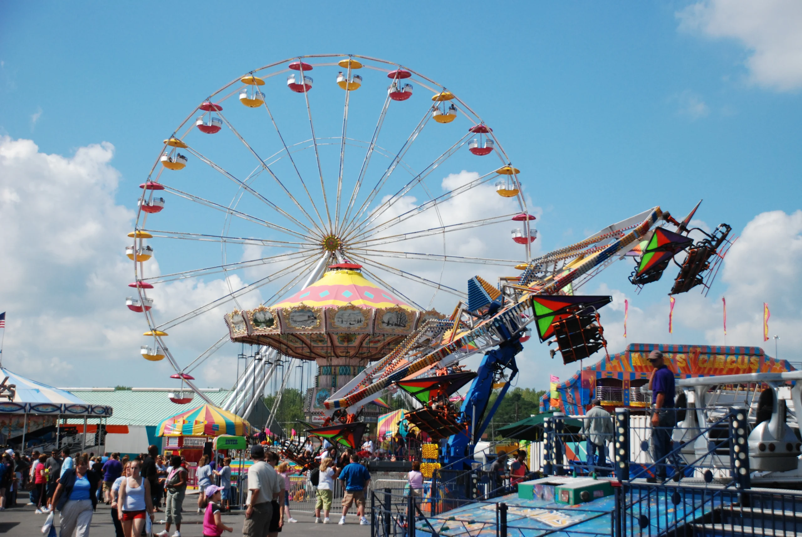 The Wade Shows midway lights up at night at the New York State Fair