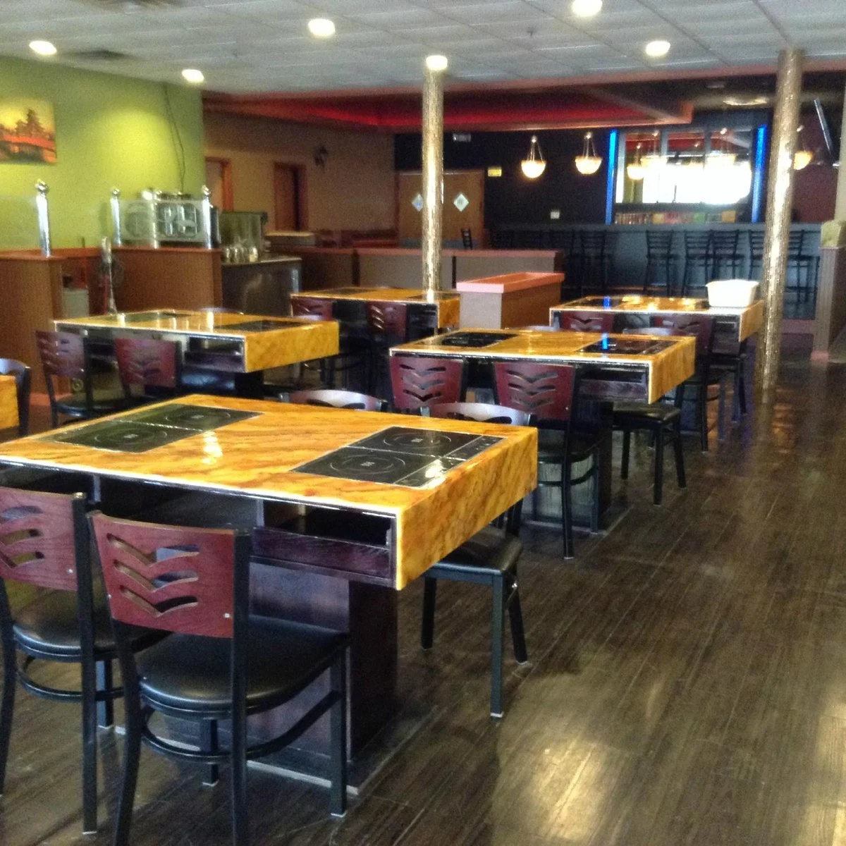 Red Chili Restaurant Syracuse interior with hot pot tables