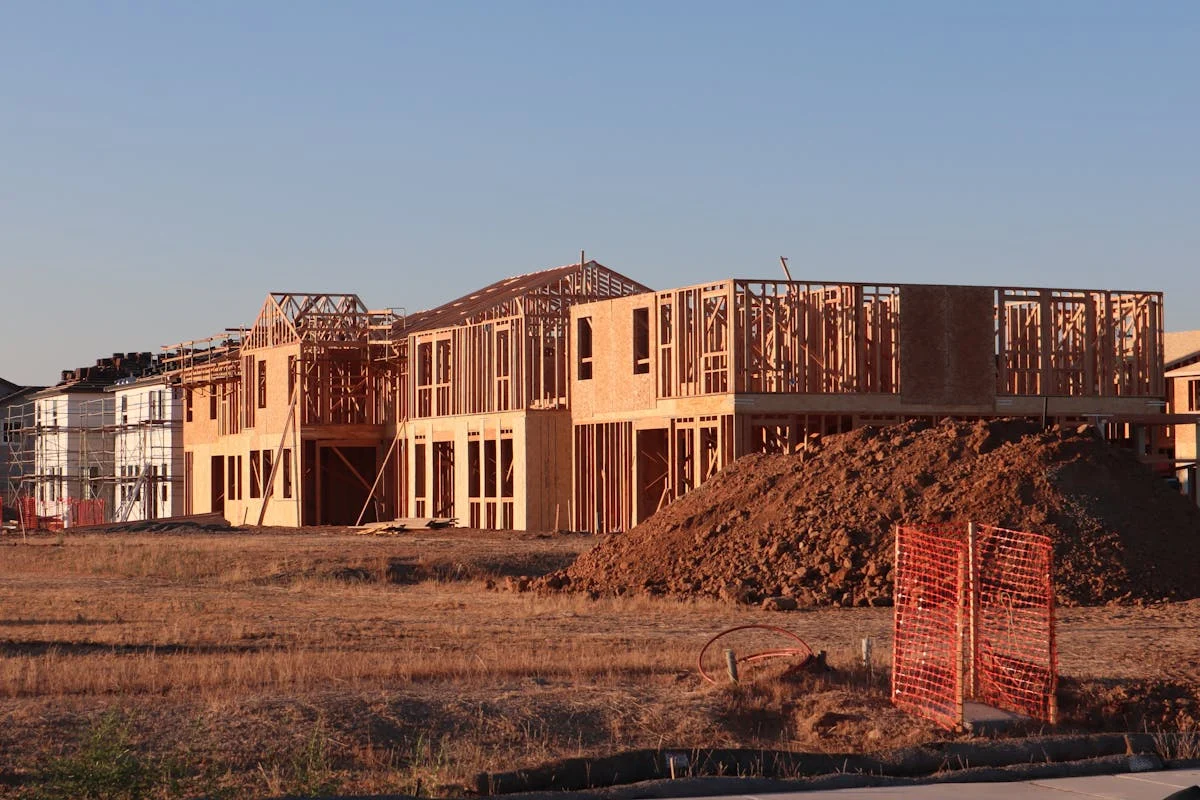 Construction underway on a new housing development, representing the type of transformation planned for the former Syracuse Developmental Center site on Tipperary Hill