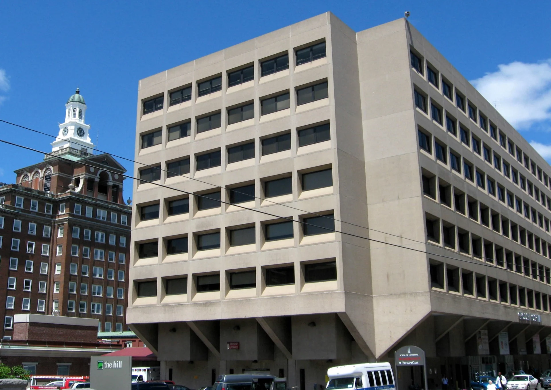 The brick and stone main entrance of Crouse Hospital on Irving Avenue, Syracuse, one of the last remaining independent community hospitals in central New York.