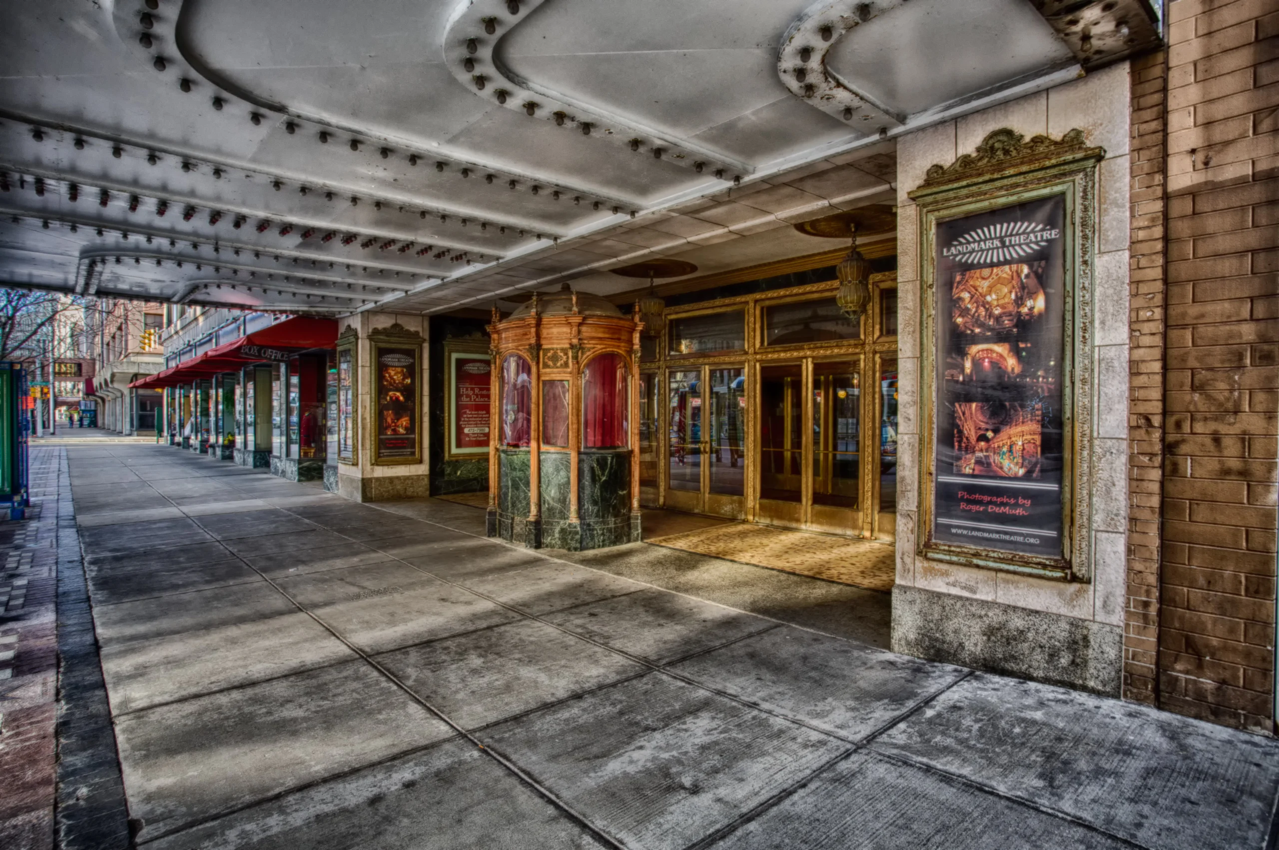 Landmark Theatre marquee and ornate Loews State Theatre facade on South Salina Street in downtown Syracuse, host venue for the 2026 to 2027 Broadway in Syracuse season