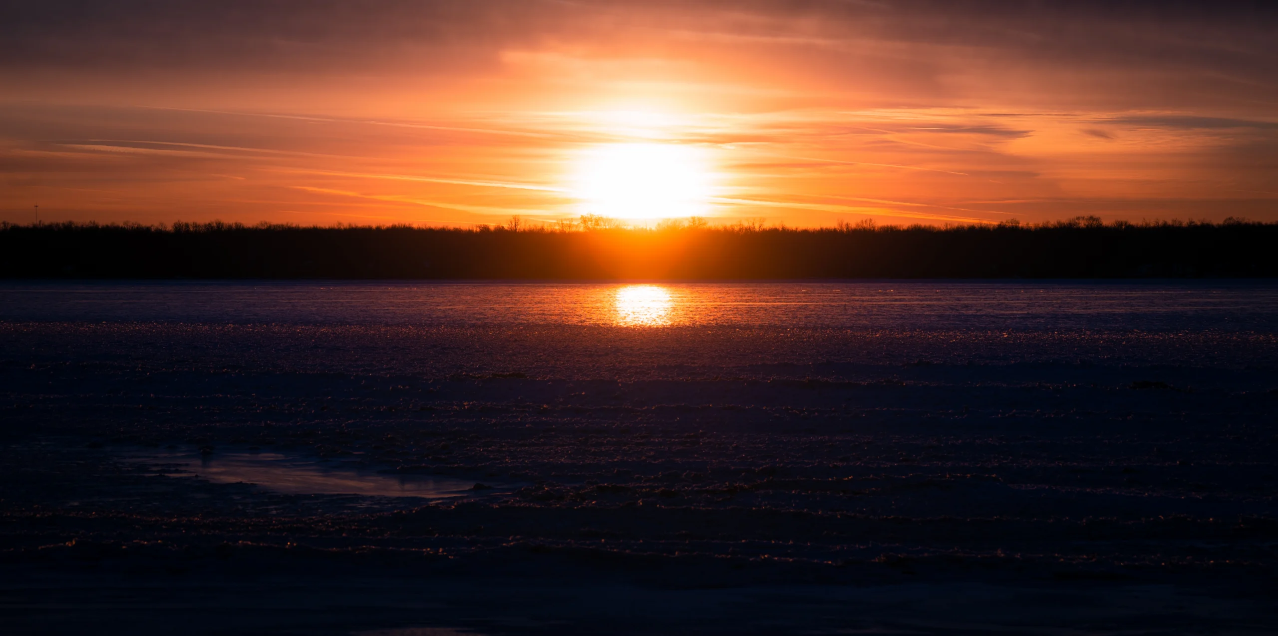 Oneida Lake at sunset, the body of water stocked annually with 150,000 walleye fry from the NYS DEC Constantia hatchery.