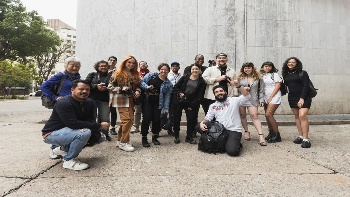 Participants in the Southside Stories project engage in photography training.