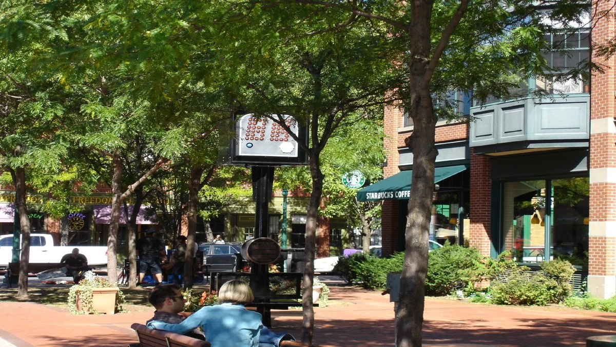 Outdoor dining and foot traffic in Armory Square, Syracuse.