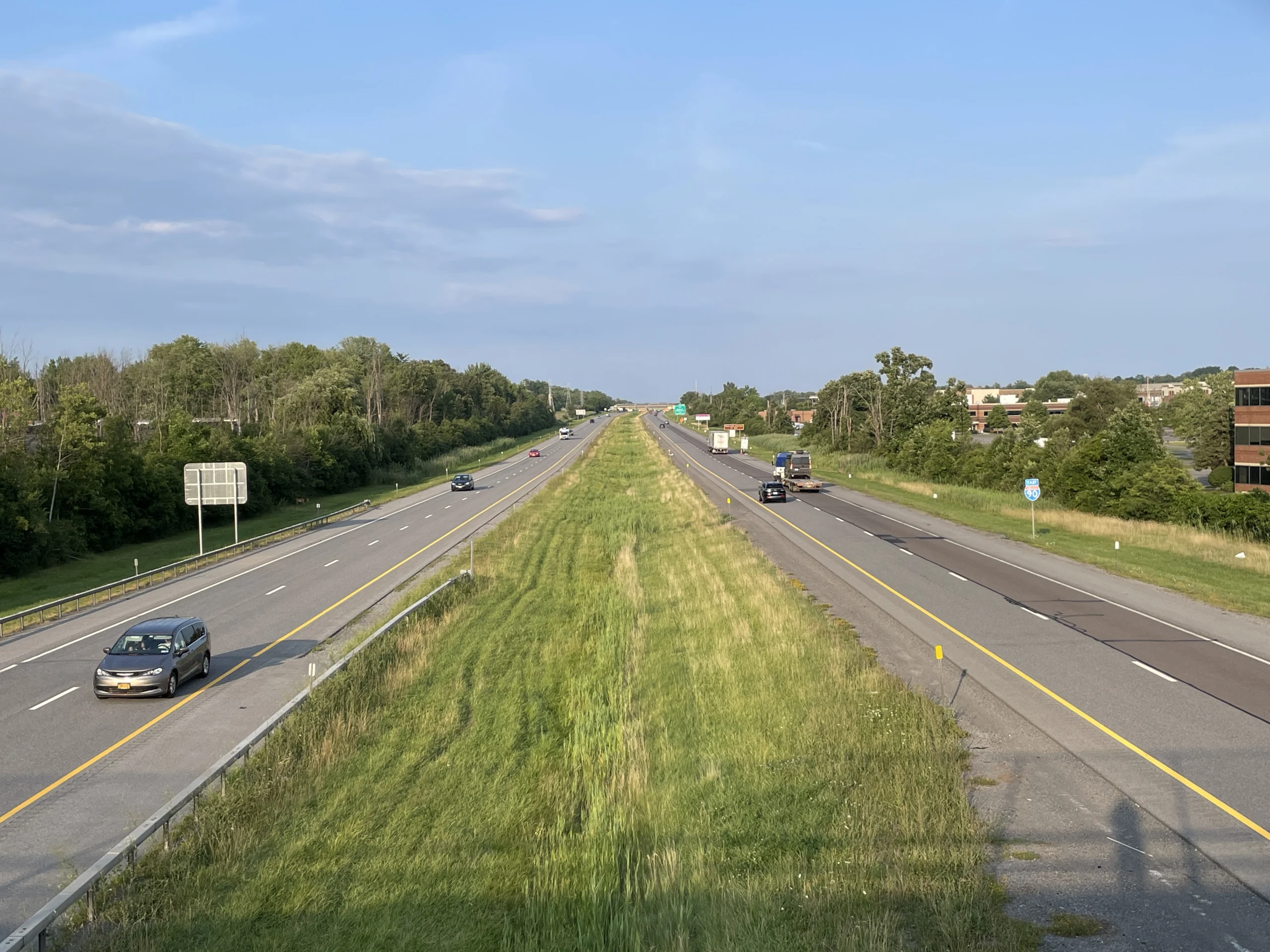 Highway lanes seen from the Route 298 overpass in East Syracuse on a summer day