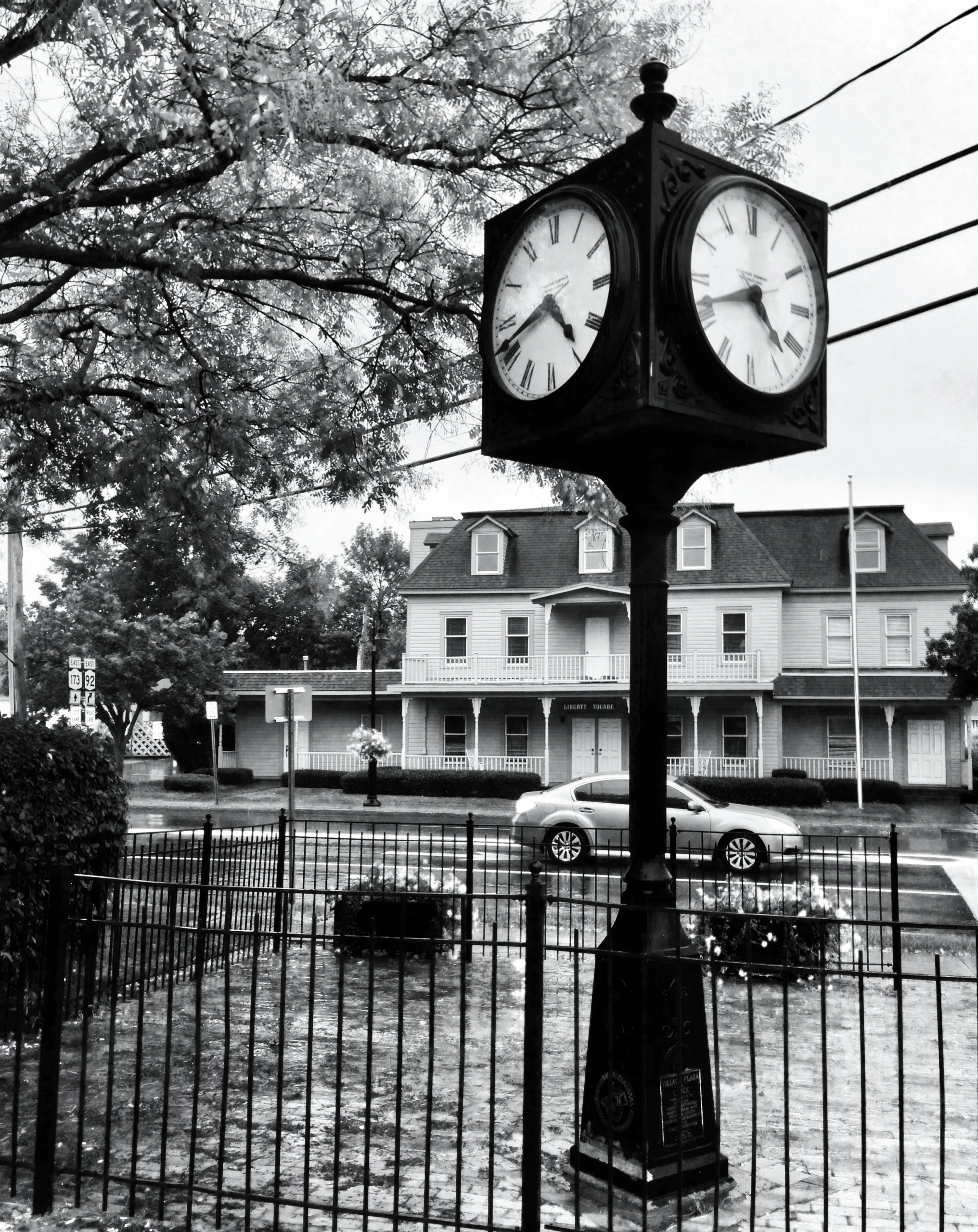 A cast iron four faced street clock at the Seneca and Fayette street corner in Manlius New York