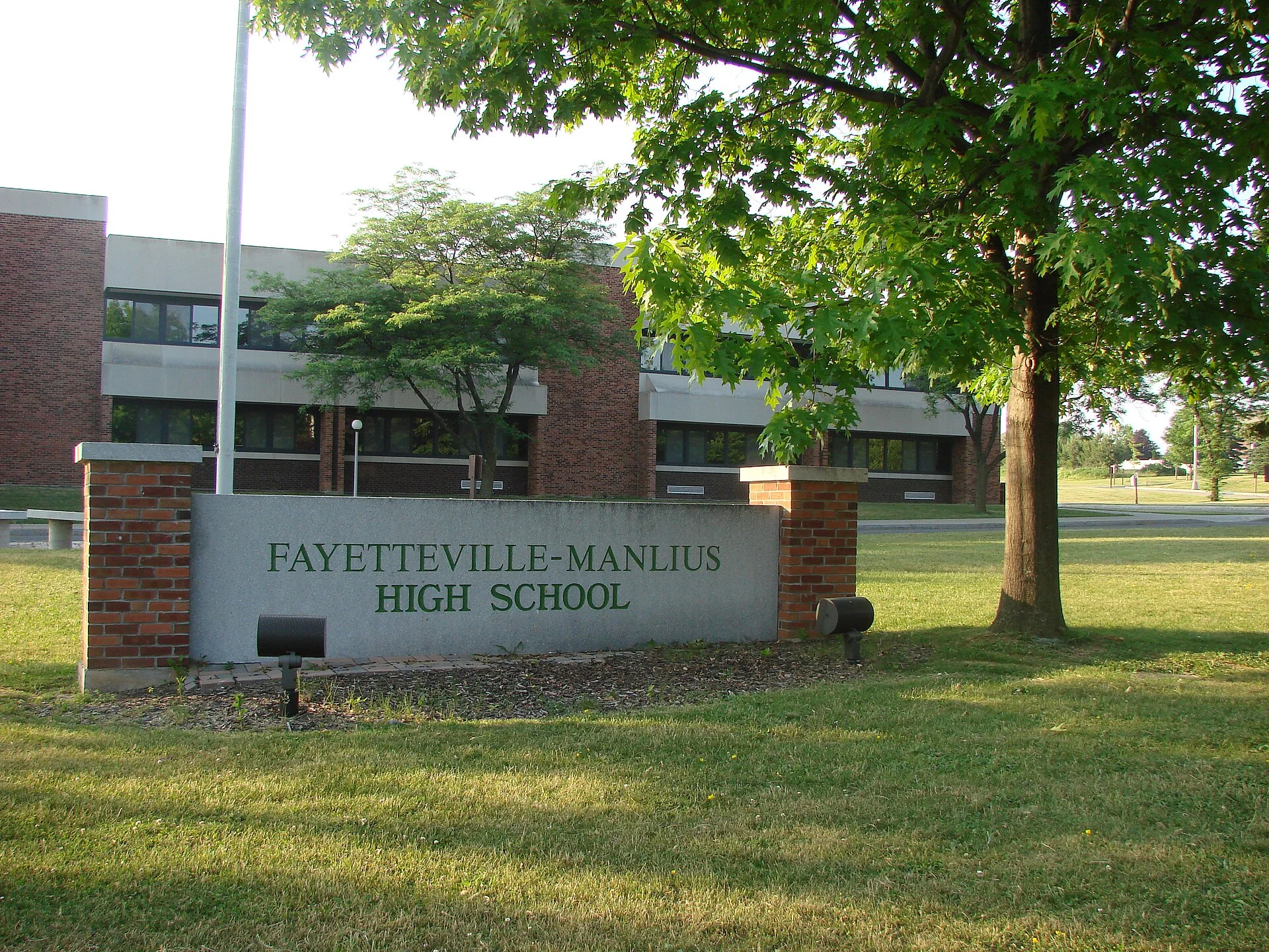 The entrance sign and building of Fayetteville-Manlius High School